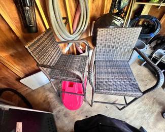 Two chairs that belong to Bar