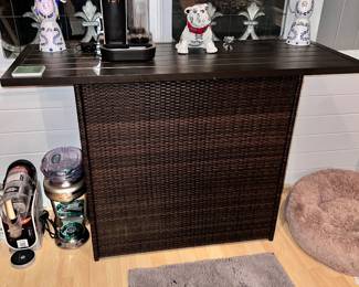 Faux wicker bar with two high top chairs