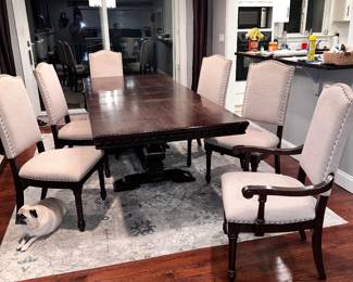 Dining table and six chairs with two extra leaves