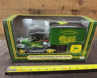 John Deere run about tractor trailer