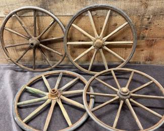 4 antique Childs wagon wheels