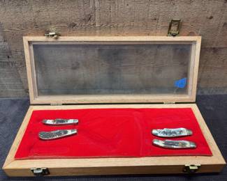 4 whitetail cutlery knives in display case