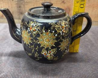 Glazed hand painted tea pot from England