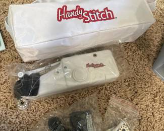 049 handystitchhandheldsewingmachinesto