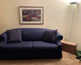 Navy Blue Upholstered Sofa with Two Accent Pillows