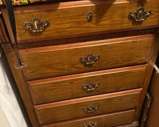 Chest of Drawers with Blankets on Top