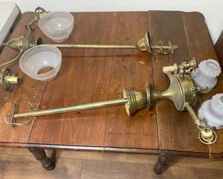 Two antique brass light fixtures glass shades