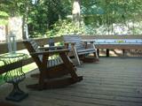 wooden patio furniture, 2 rockers, 1 chair w/ ottoman