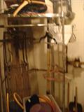 old sled, hanging rack, hangers, beach hats & bags