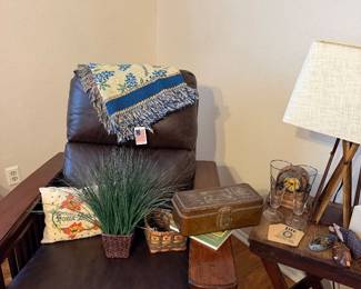 Leather recliner, bluebonnet, wood table, pillow, lamp