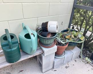 Collection of Assorted Garden Planters and Watering Cans