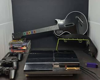 Sony PS3 Console w Gibson Guitar Hero Guitar Controller, Additional Controllers, and PS3 Video Games