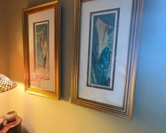 . . . two floral framed pieces