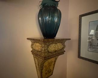 . . . art glass vase on sconce