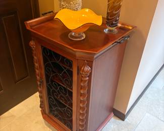 . . . cute cabinet and art glass