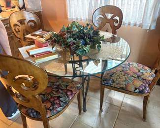 . . . glass top kitchen table and chairs