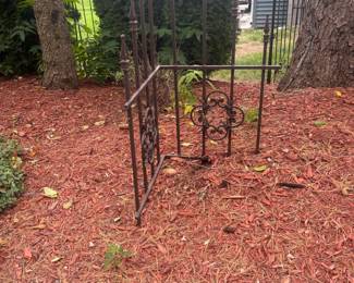 . . . wrought-iron corner fence