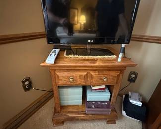 . . . flat screen TV and stand