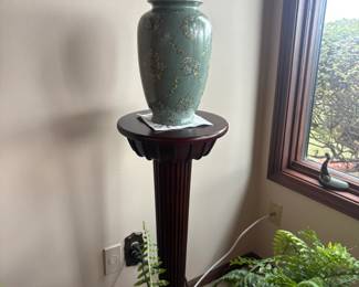 . . . beautiful pottery vase on stand