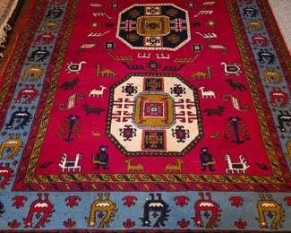 Several wool area rugs