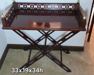 Chippendale-style butler's tray table with an ornate pierced fretwork gallery