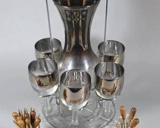 MCM silver fade decanter and wine glass set with a chrome caddy