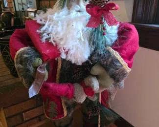 Large pine cone-themed Santa figure