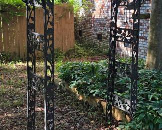 Black cast iron and steel garden arbor