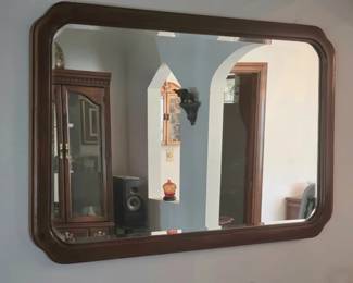 Large wood framed beveled edge mirror