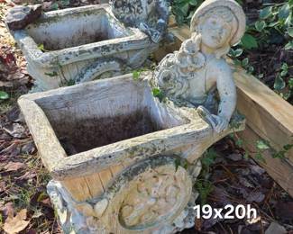 Multiple child and wheelbarrow concrete planters