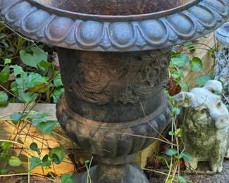 Tall pedestal cast iron urn planter with embellishments on sides, multiple available