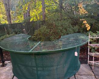 Semi-circular wrought iron outdoor bar
