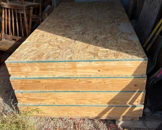 f Set of Four Raised Wooden Platforms