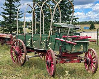 c Antique HorseDrawn Covered Wagon