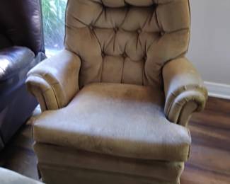 Swivel and rocker chair with ottoman
