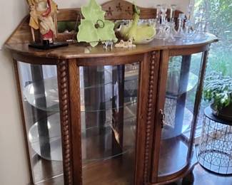 Double oak curio cabinet