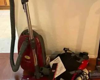 NE193Two Vacuum Cleaners