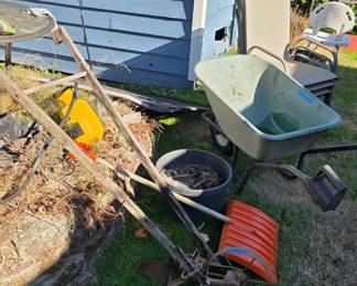 Vinatge hand plow and misc garden items