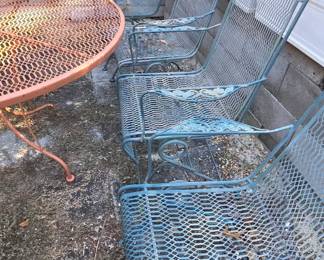 #169	Wrought Iron Round Table (painted orange) w/4 Bouncy chairs - 48D x 28	 $175.00 