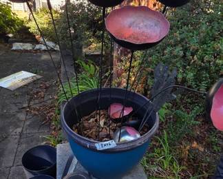 #251	Blue Plastic Pot w/Metal Flower Art pieces (11 pieces (extra in bottom of pot))	 $20.00 