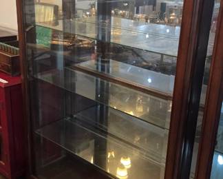 #23	Wood Display Cabinet w/3 Glass shelves and Beveled Glass door that slides both ways on Front - lighted - 42x15x60	 $200.00 