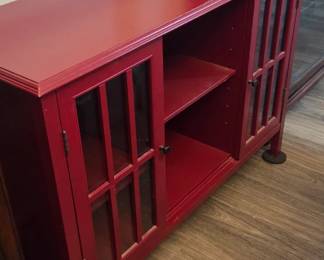 #25	Red Painted Laminate Console Table w/2 glass Doors and 3 shelves (finish issues) - 46x16x31	 $125.00 