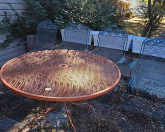 #169	Wrought Iron Round Table (painted orange) w/4 Bouncy chairs - 48D x 28	 $175.00 