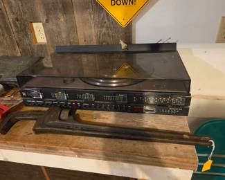 Vintagec record player - powers on otherwise untested. Large pipe wrench