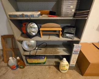 Large spot light, paper towel rack, clamp light, hamster cage, blinds
