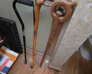Walking aids - two are carved wood