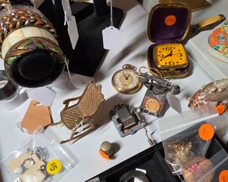 Trinkets, pocket watch, table clock