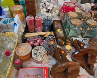 Candles, wood wall shelves, cork lid jars
