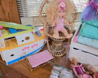 More dolls, Doll chair,  Barbie boat, play tea set