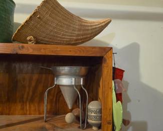 Wicker cornucopia and vintage metal vessel